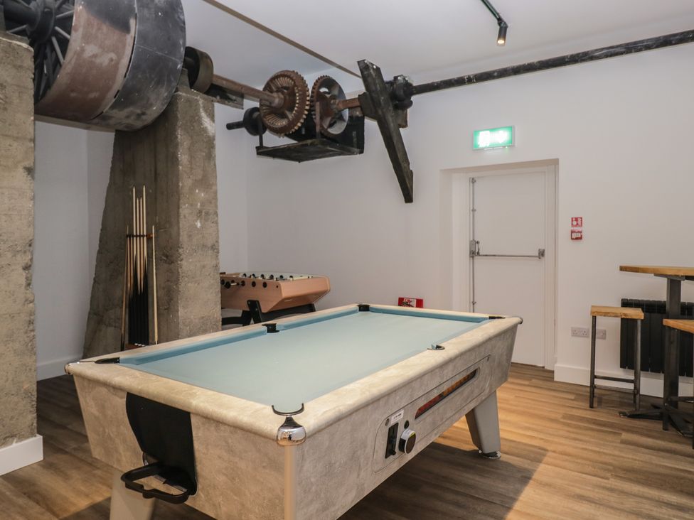 A game room with a pool table and foosball table at Apartment 3 in Keswick