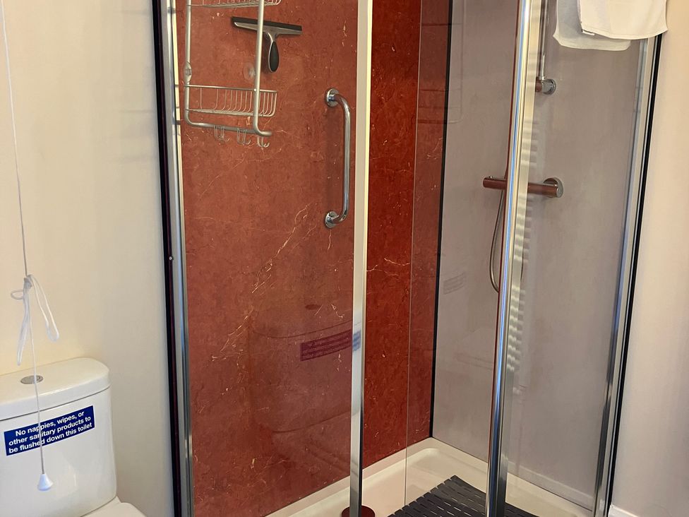 A bathroom featuring a shower and a toilet at Ludlow House in Ludlow