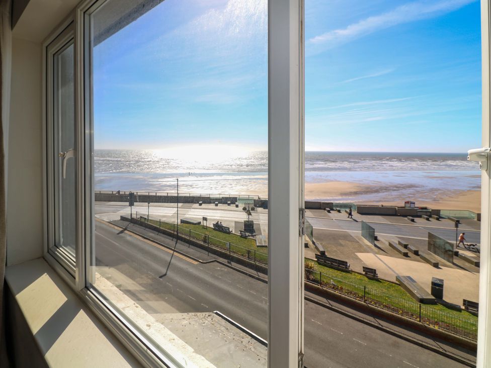 A view of the sea and beach from a window at Apt 8 @ Hunter's Quay, Bridlington