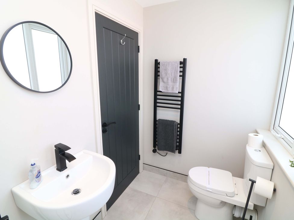 A bathroom with a sink and toilet at Apt 9 @ Hunter's Quay in Bridlington