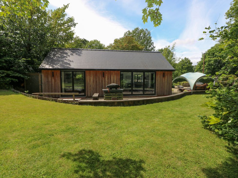 A house with a garden and outdoor furniture at Glas y Dorlan Nevern near Newport, Pembrokeshire