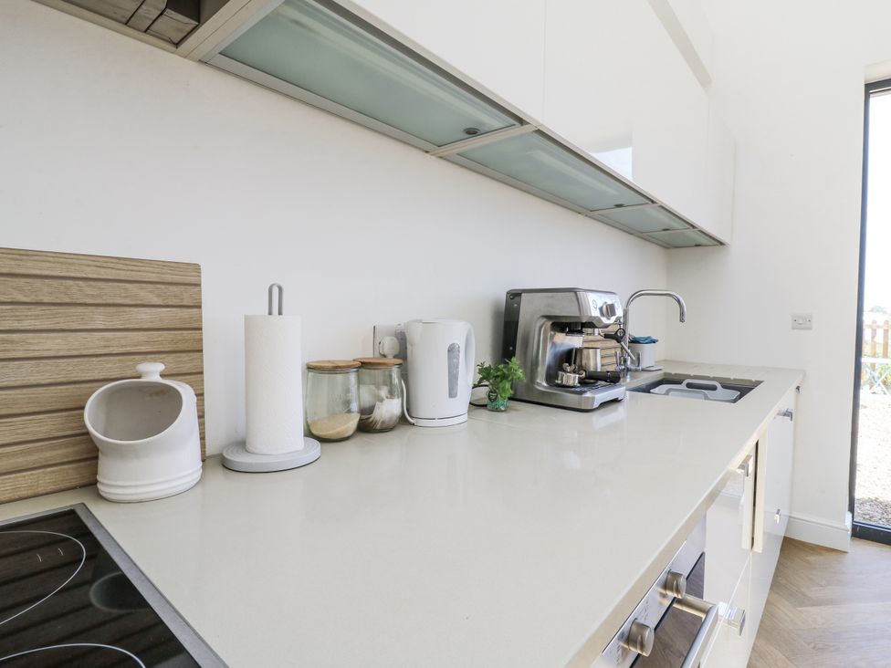 A kitchen with a coffee machine and kettle at Little Yeat Farm (4 Bed/4 Bath) Aylesbury