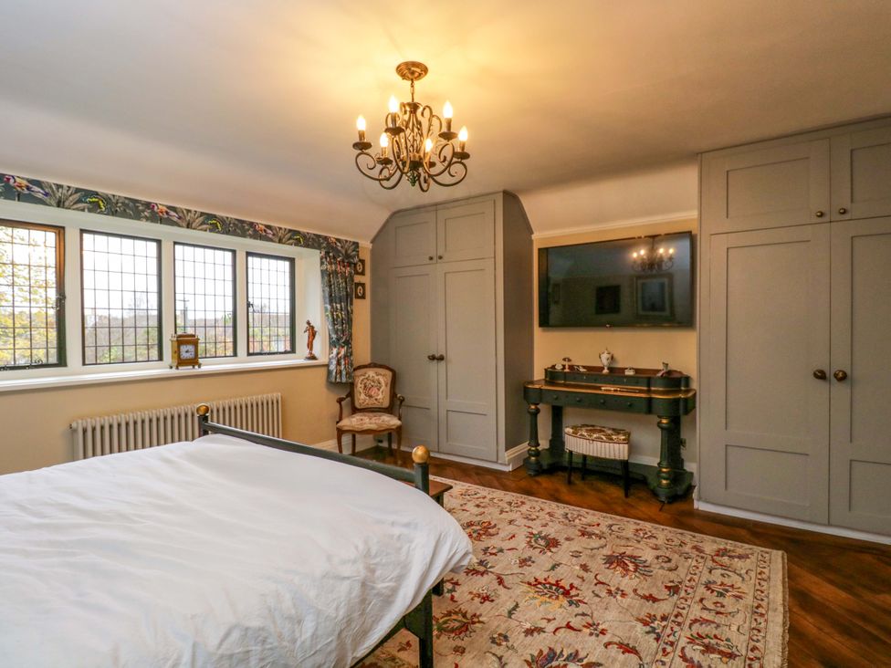A bedroom with a bed and window at White House
