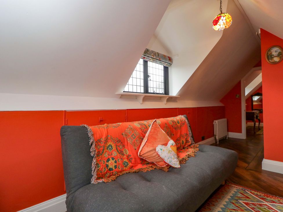 A living room with a sofa and window at White House