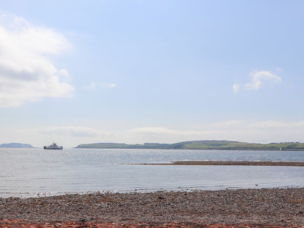 A view of water and a boat at The Old Rectory in Largs