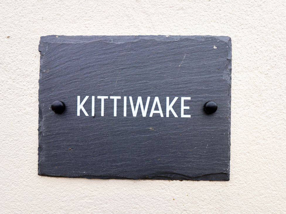 A nameplate with the text Kittiwake at Kittiwake in Flamborough
