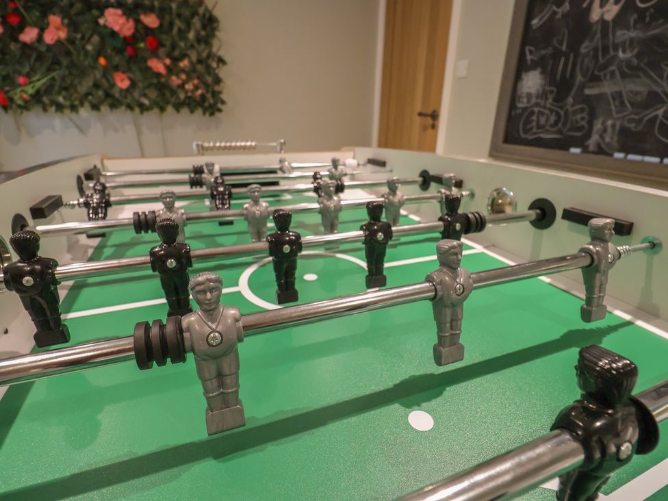 A foosball table with players at 13 Downside Close in Charmouth