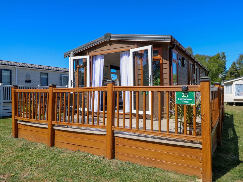 An outdoor view of a wooden deck at 25 Foxburrow Hang in Fritton near Belton