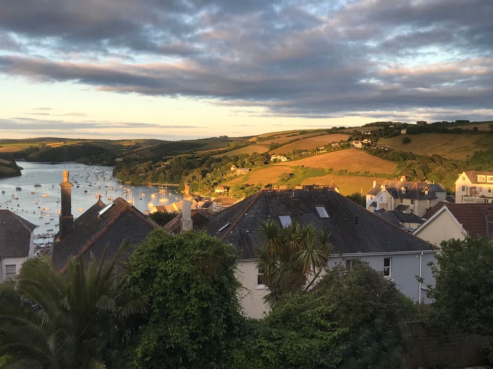 A view of a river with boats and houses at Firm Anchor in Salcombe