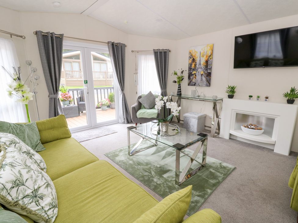 A living room with a sofa and coffee table at The Haven in 