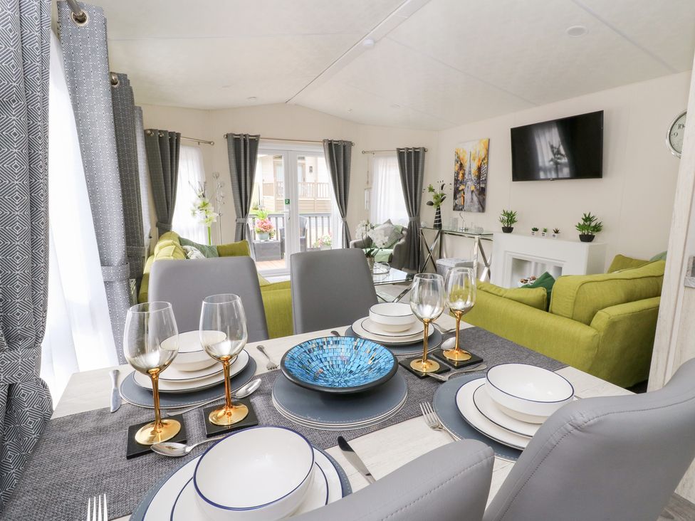 A dining room with a table set in The Haven 