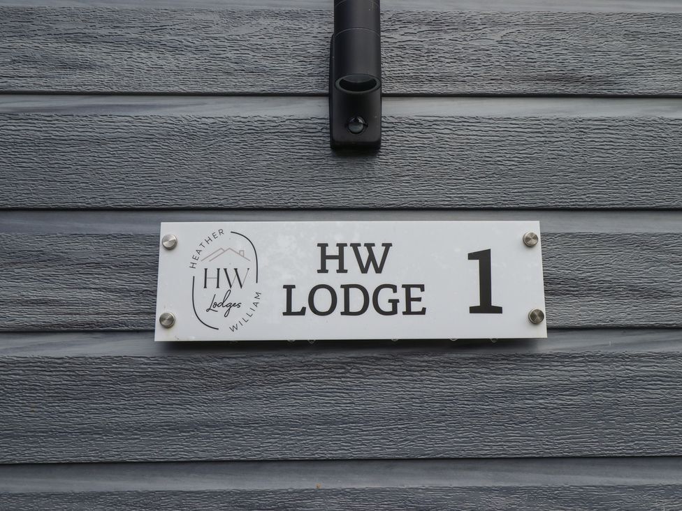 A sign indicating HW Lodge 1 at Heather William Lodge near Woodhall Spa