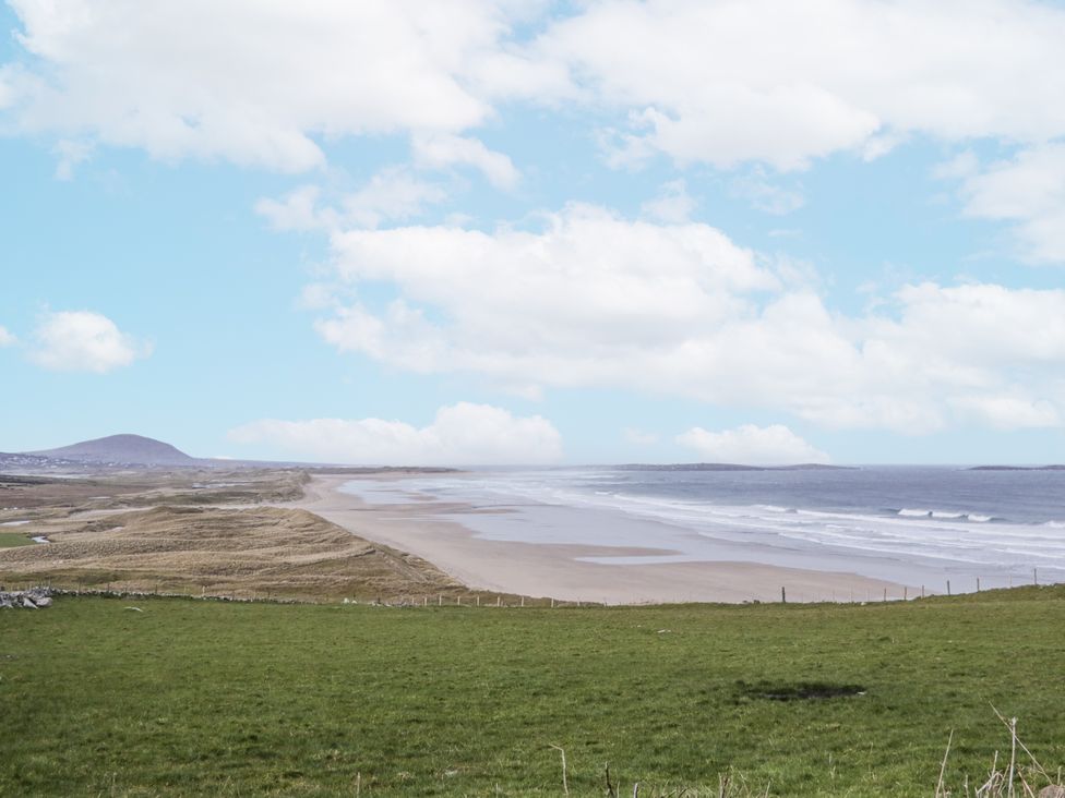 A coastal view with sand and sea at Cashelrehine in Falcarrheh
