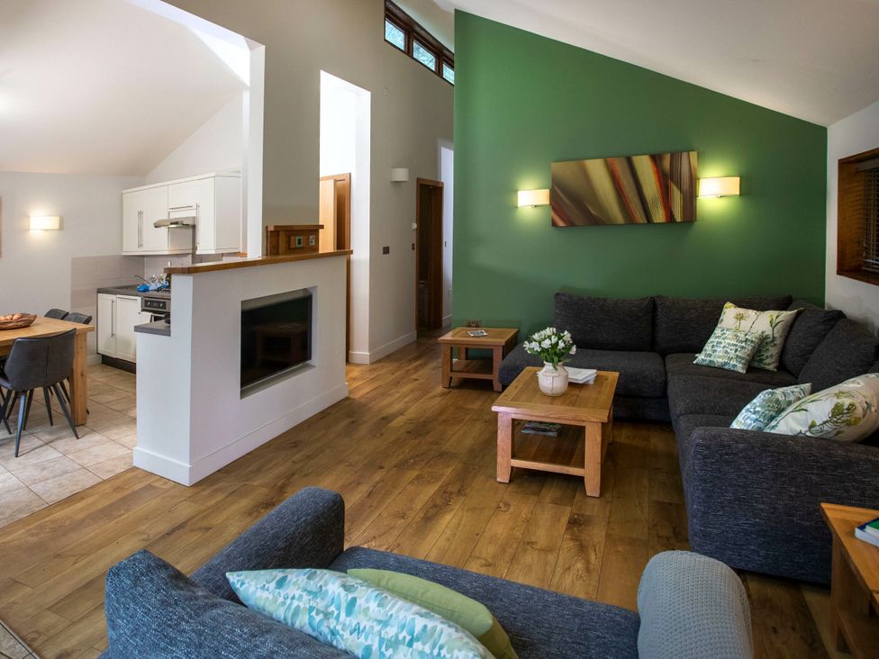 A living room with a sofa and coffee table at Cropton Golden Oak in Cropton Forest