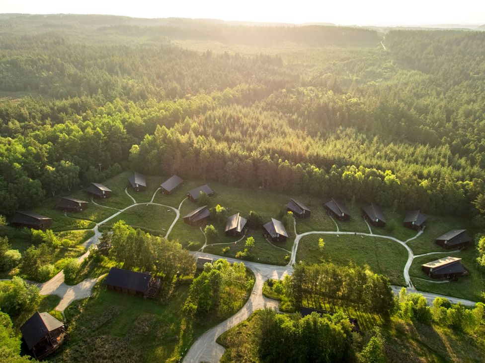 An aerial view of cabins and greenery at Cropton Golden Oak in Cropton Forest