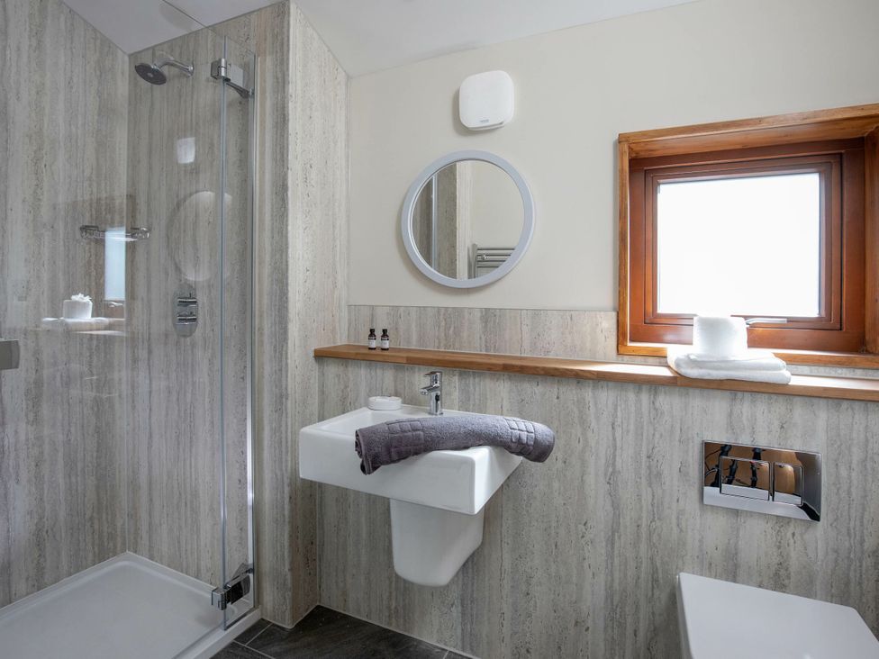 A bathroom with a shower and wash basin at Delamere Forest Golden Oak Delamere Forest