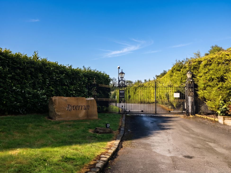 A gated entrance with a sign at River Run in Belturbet, County Cavan