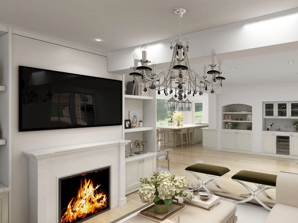 A living room with a fireplace and television at The House at School Farm in Hassall near Haslington