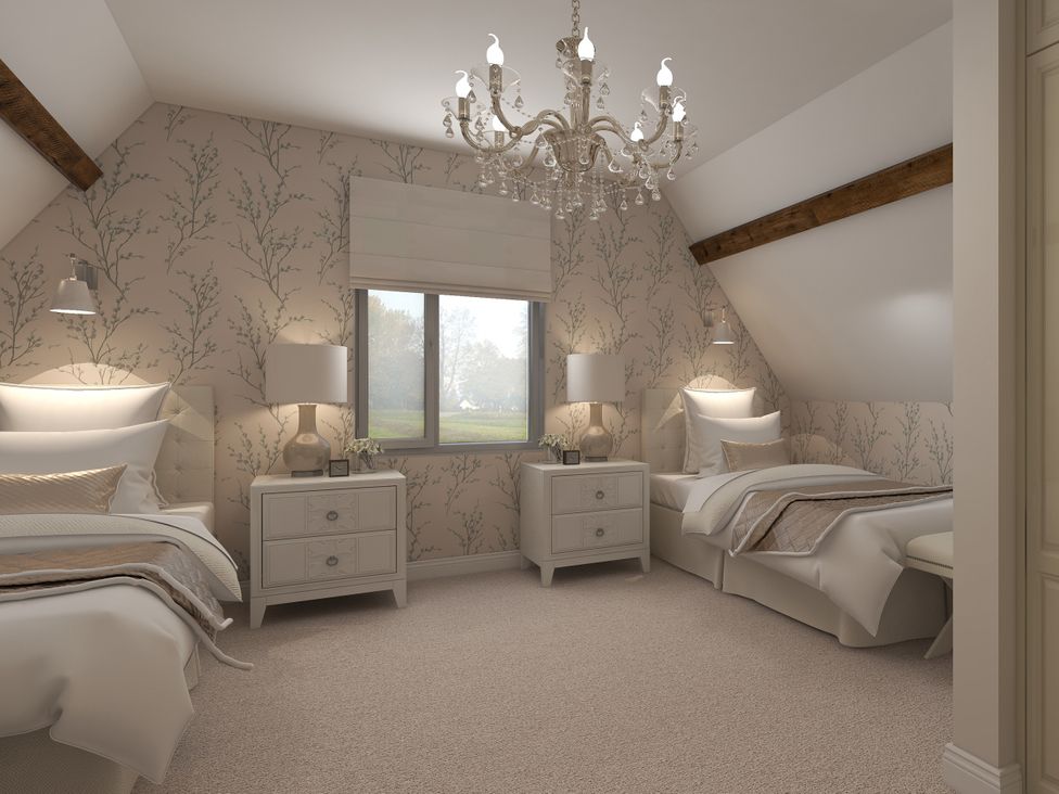 A bedroom with two beds and a chandelier at The House at School Farm in Hassall near Haslington