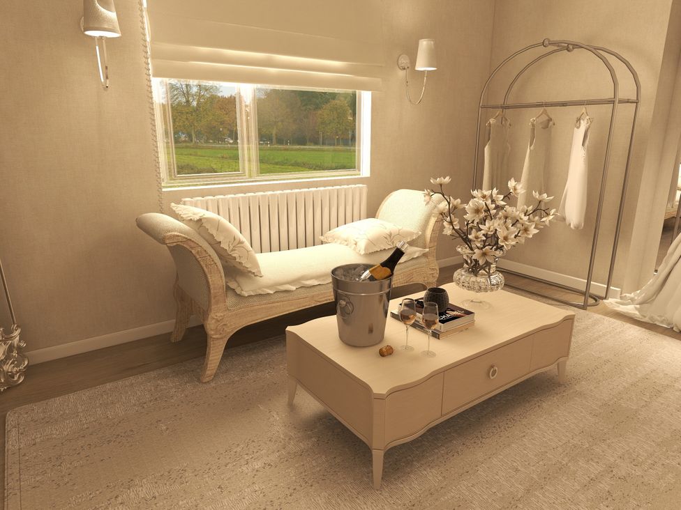 A living room with a sofa and coffee table at The House at School Farm in Hassall near Haslington