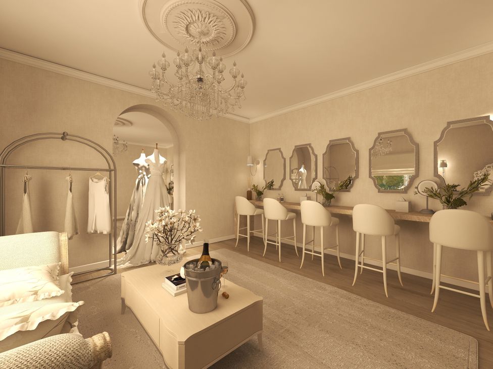 A dressing room with mirrors and a clothing rack at The House at School Farm in Hassall near Haslington