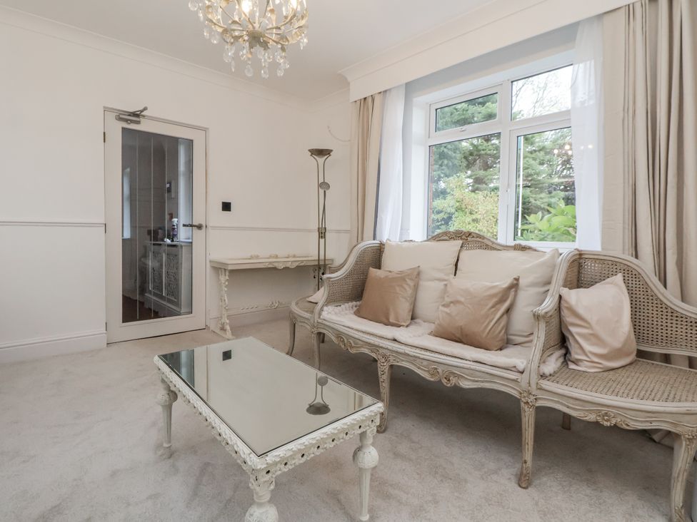 A living room with a sofa and coffee table at The House at School Farm Hassall near Haslington