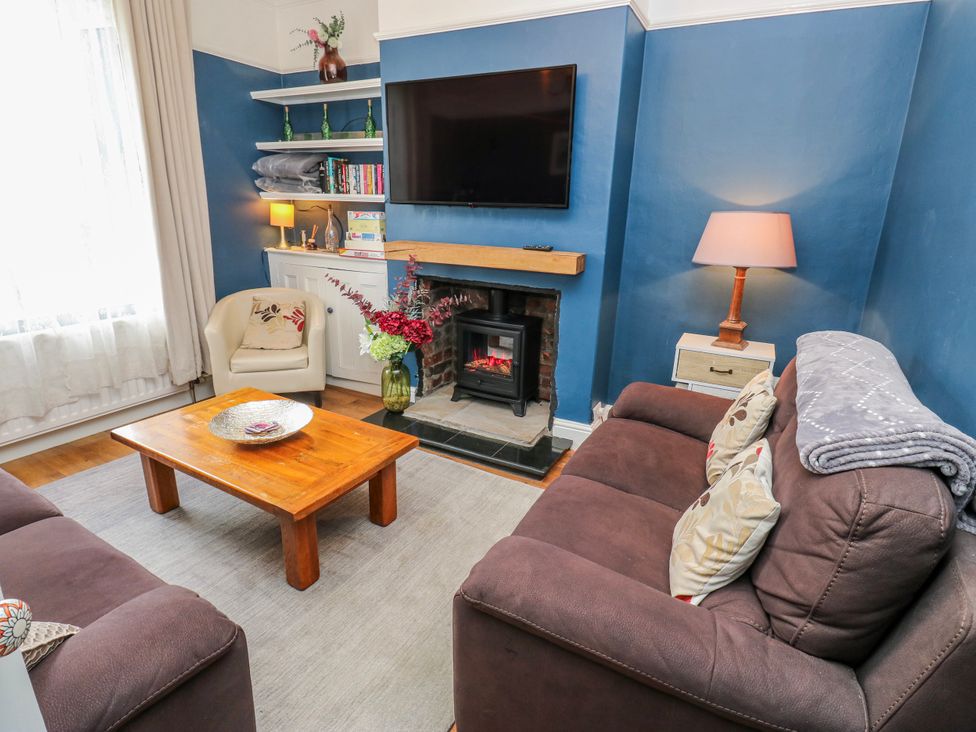 A living room with a sofa and a coffee table at 49 Waddington Road in Clitheroe