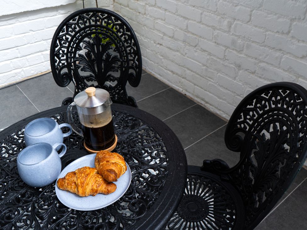 A table with croissants and coffee pots at The George in Whitley Bay