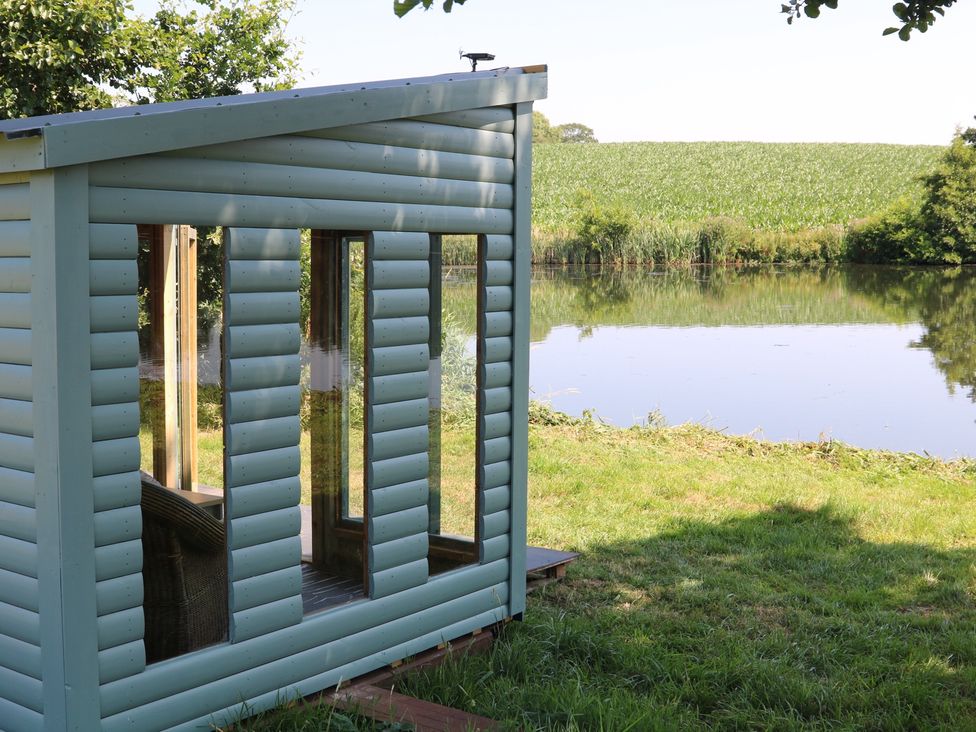 A cabin by a lake at Holmside Audley Brow near Market Drayton