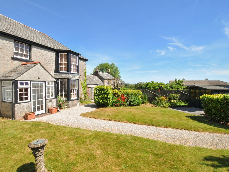 A garden pathway in front of a house at Smugglers in Porthpean near St Austell