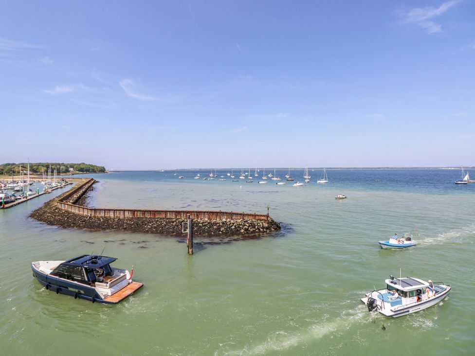 An outdoor view of boats in water at 4 Copse Lane Freshwater