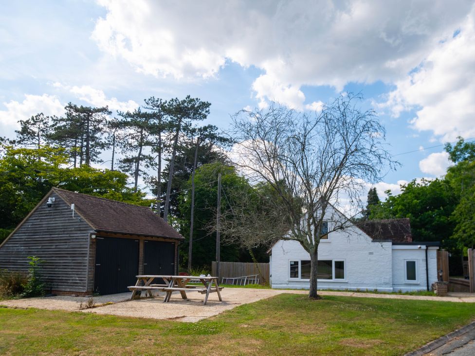 An outdoor area with a house and garage at Gildridge in Whitesmith near East Hoathly