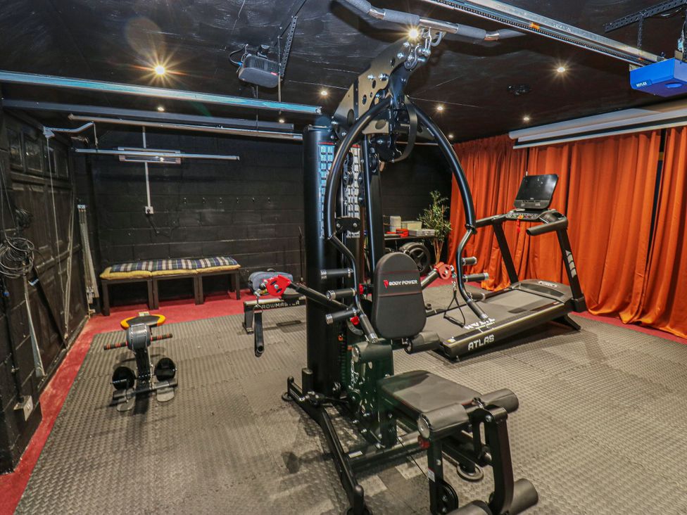A gym with exercise equipment at Akila Grasscroft near Greenfield