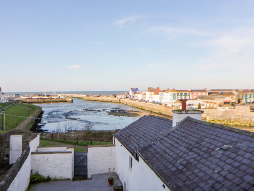 A view of the harbor with buildings in Aberaeron