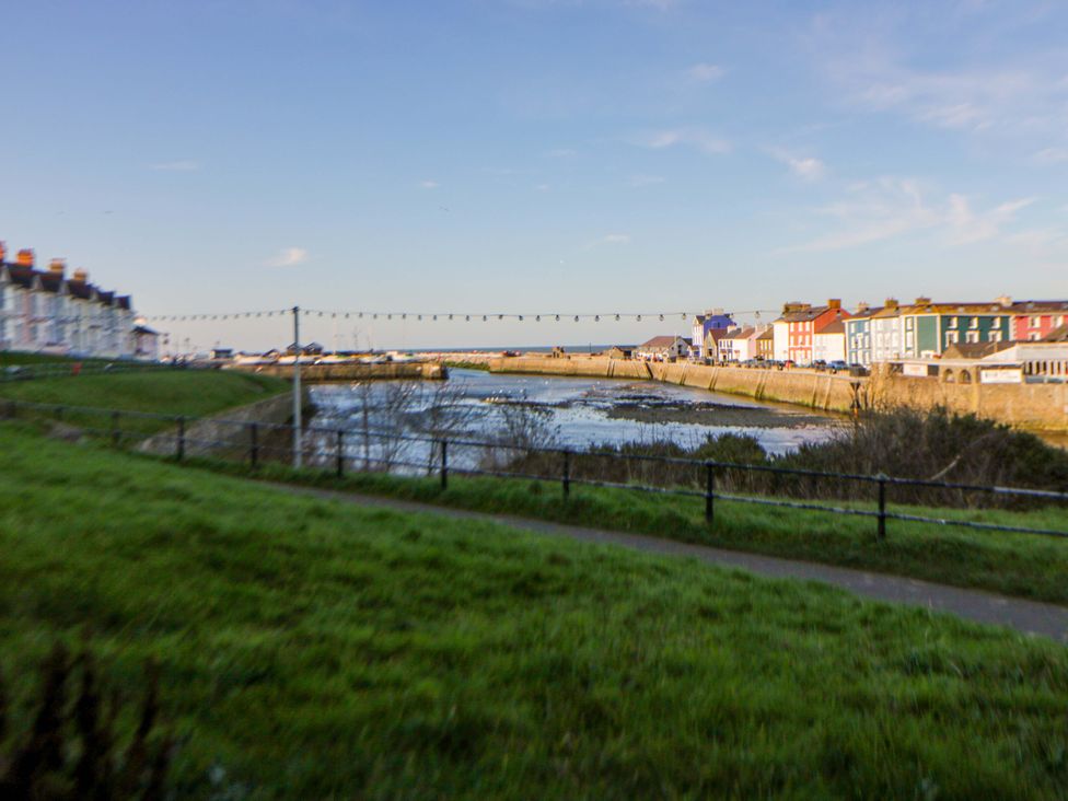 A view of houses along the waterfront at Island House Aberaeron