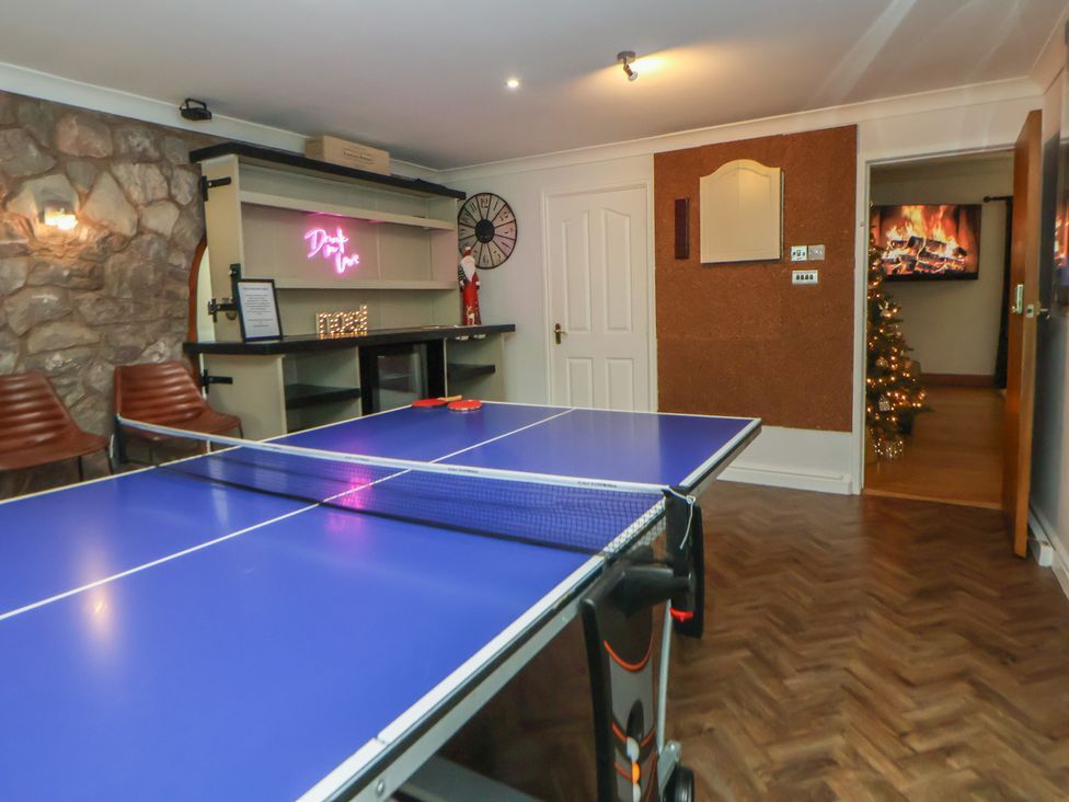 A games room with a table tennis table at Brookway Lodge in Caerwys