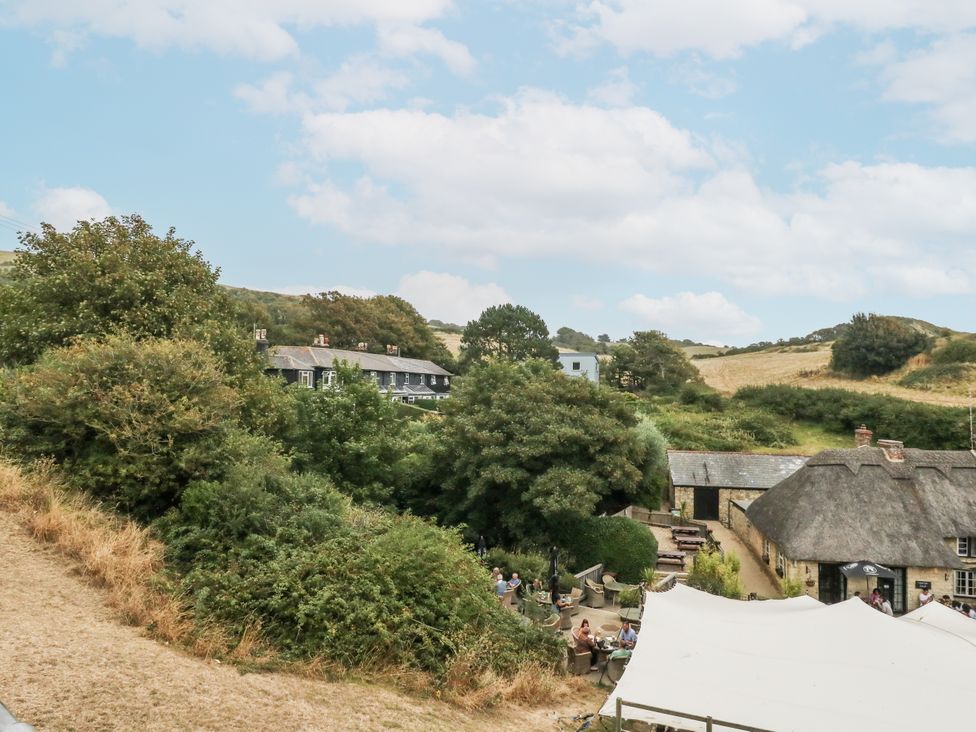 An outdoor area with houses and trees at Chenies in Osmington Mills, near Preston