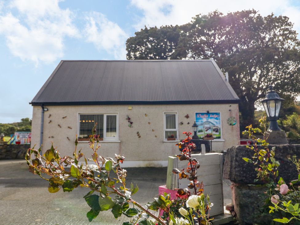 A building with a sign at Duffy Lodge, Kilmacloo near Creeslough, County Donegal