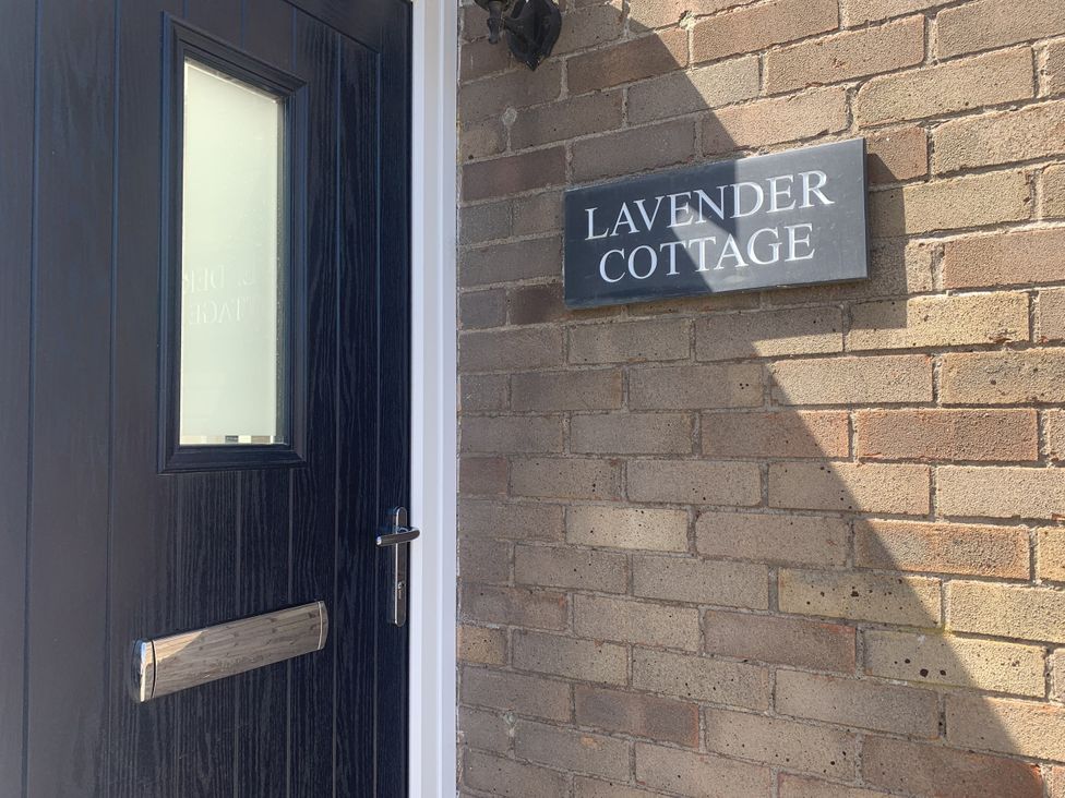 A door and nameplate at Lavender Cottage in Beadnell