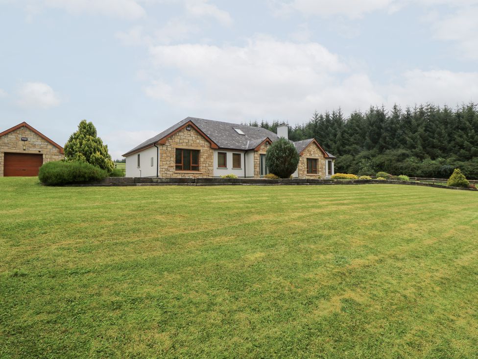 A house with garage and lawn at Swan Lake in Cloonshaghan near Boyle, County Roscommon