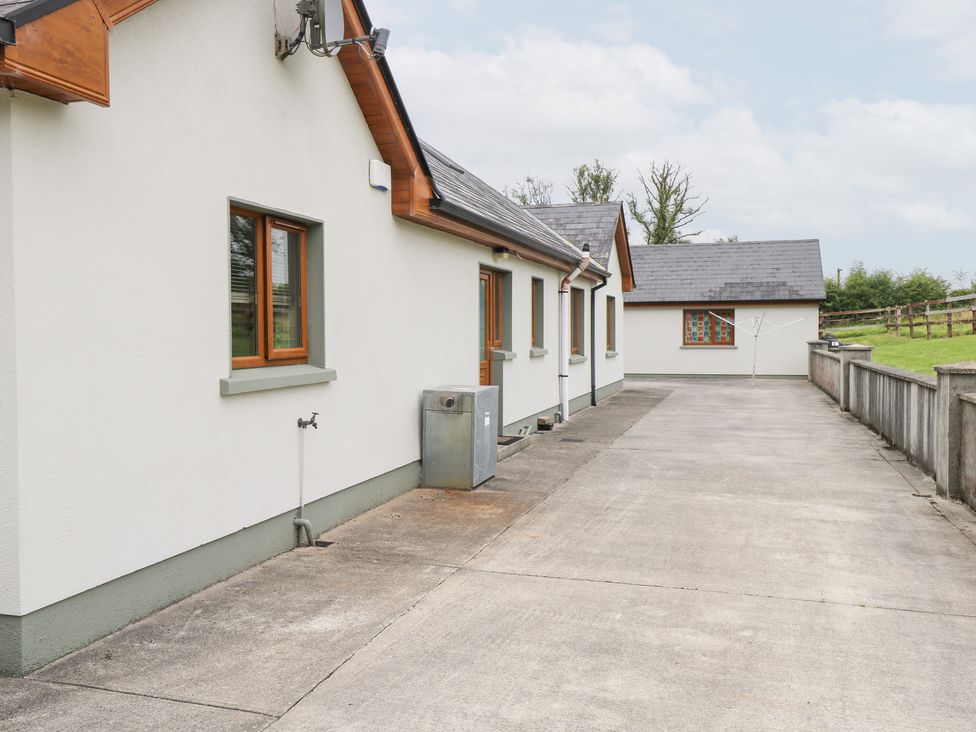 An exterior view of a house with a driveway at Swan Lake Cloonshaghan near Boyle, County Roscommon