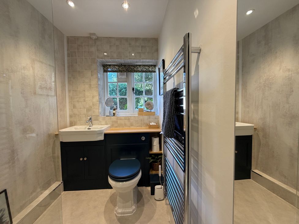 A bathroom with a sink and toilet at Coppice Hill House in Bishop's Waltham