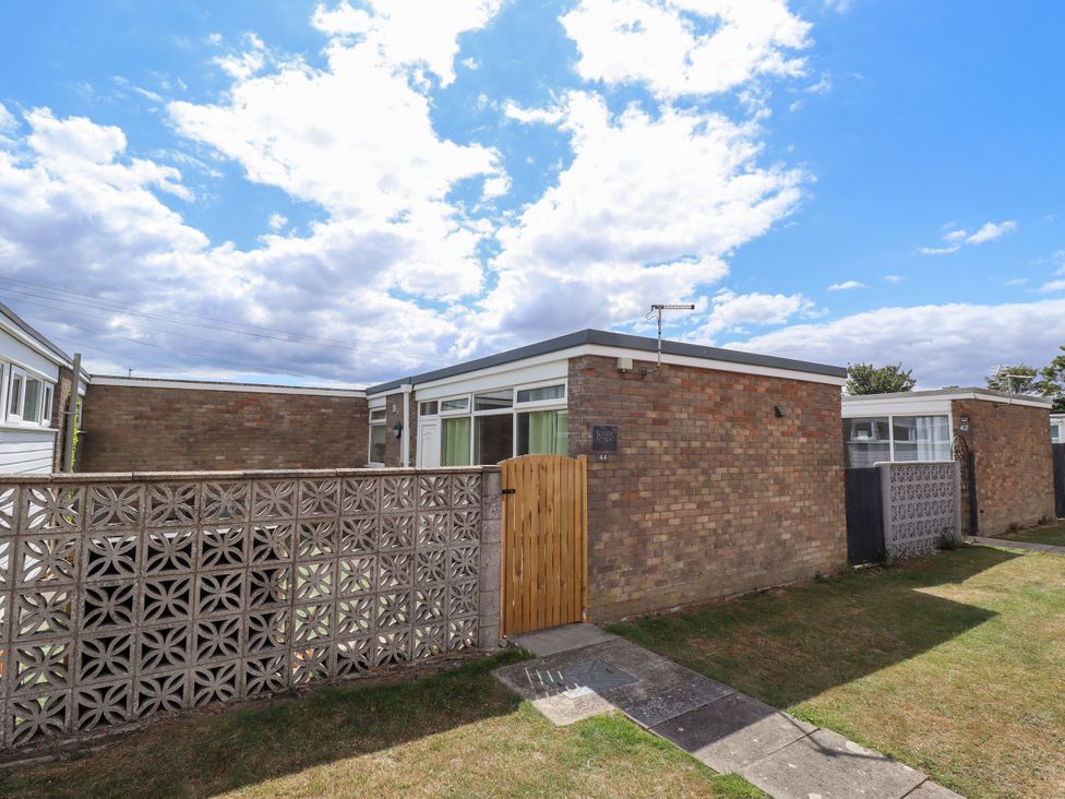 An outdoor view of a property entrance at Seaside Retreat Chapel Point near Chapel St Leonards