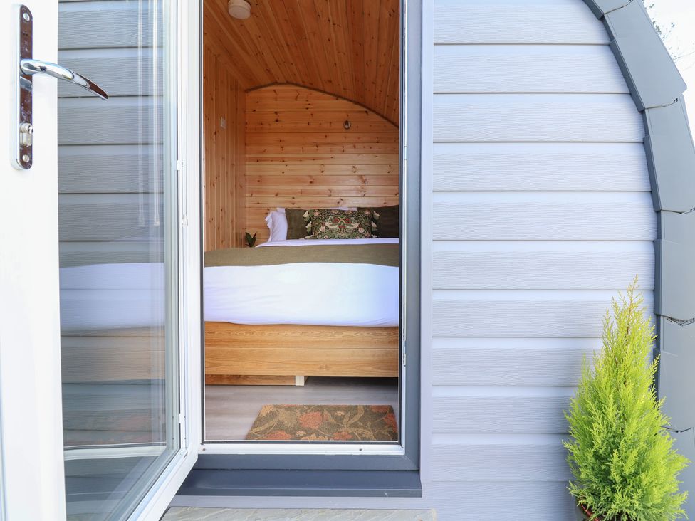 A bedroom view from the entrance at Lili Wen Fach in Ruthin