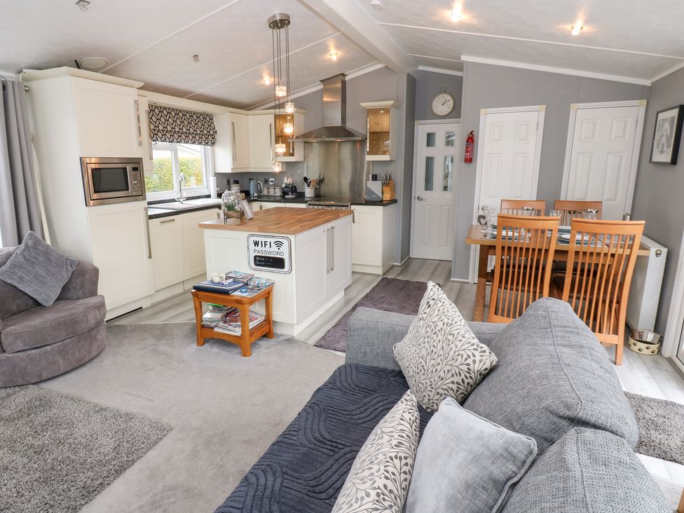 An open plan kitchen and living area at A and C Lodge-Plot 21 Armathwaite