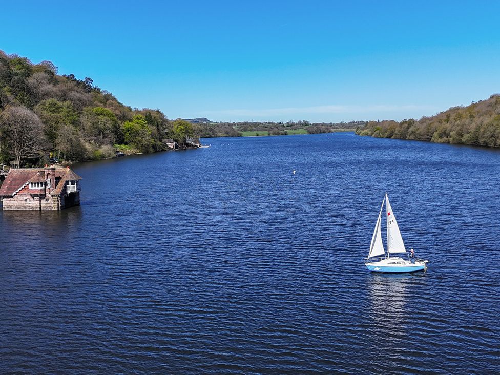 A sailing boat on the water at Lady Of The Lake Rudyard Lake