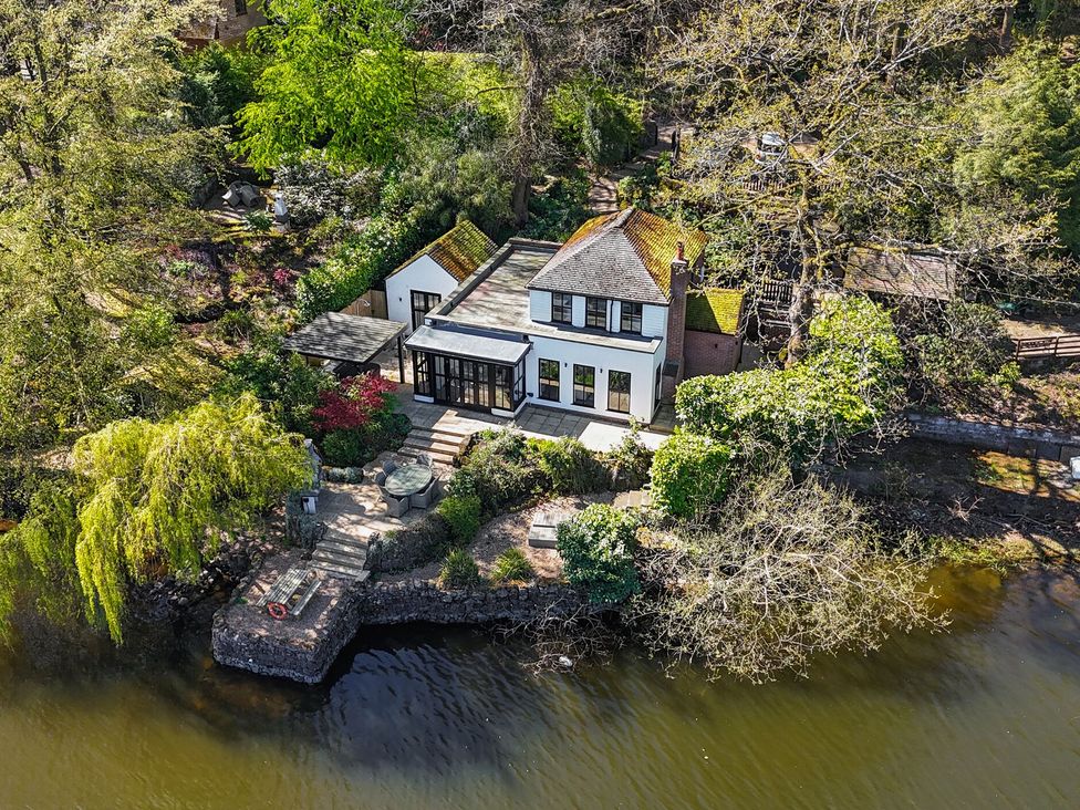 A house with garden by the water at The Sheiling Rudyard Lake