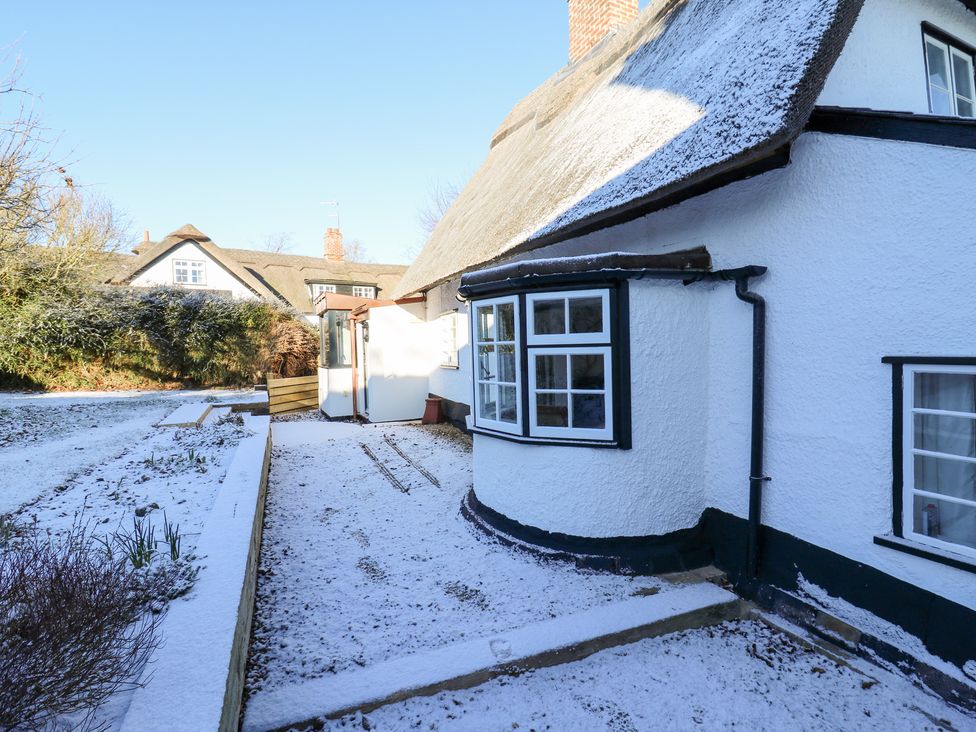 An outdoor area with a house and snow at 66 High Street in Cambridge