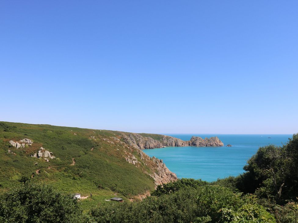 A coastline view with sea and cliffs at Fair View in St Just in Roseland near St Mawes