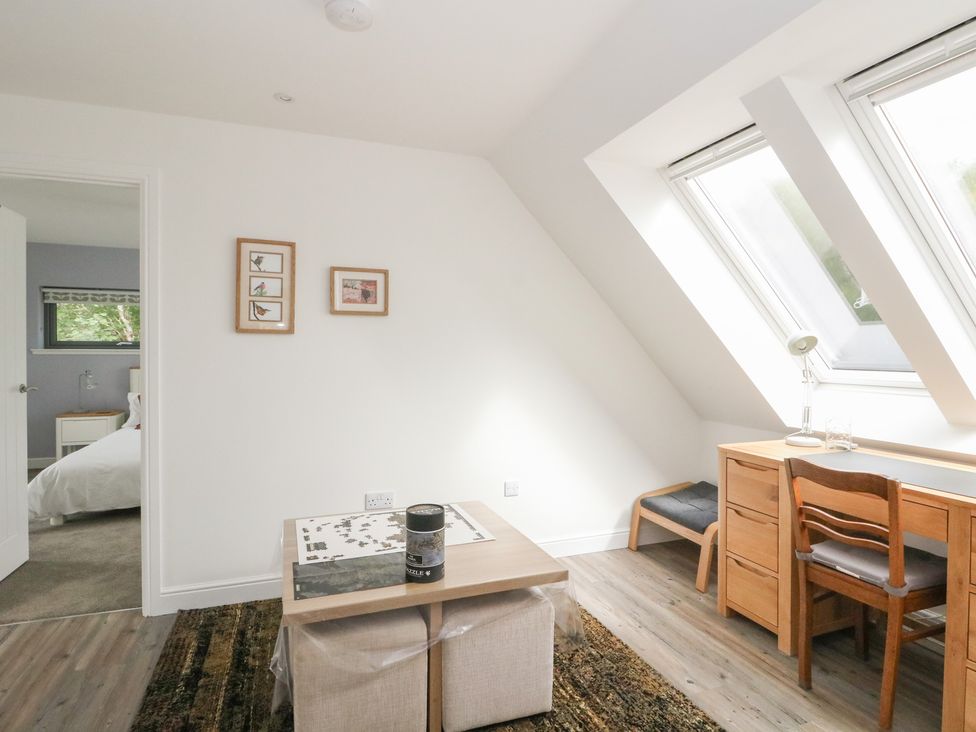 A study room with a desk and chairs at Taigh Creag Thulach Taynuilt